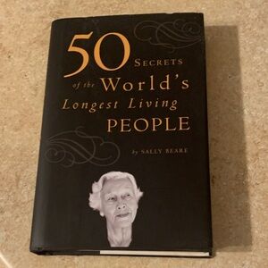 Source Unknown Black and Gold Book